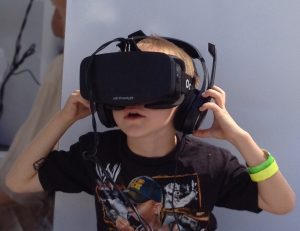 Boy_wearing_Oculus_Rift_HMD
